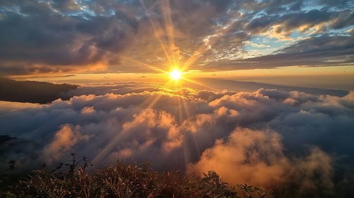 Sunrise Above the Clouds